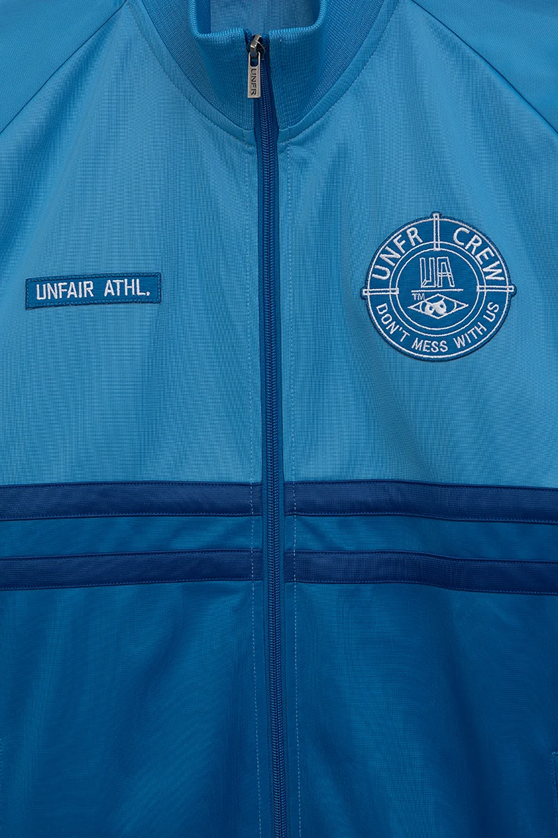 UNFAIR ATHLETICS DMWU Tracktop | Royal / Skyblue