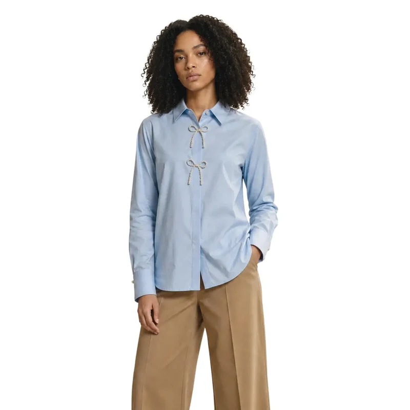 Only Damen Hellblaues Baumwoll-Poloshirt mit langen Ärmeln, mit Perlendetails